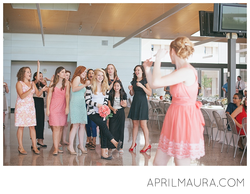 April Maura_Tempe Wedding Photographer_Redemption Gilbert Wedding_Best_Bouquet Toss_0122.jpg