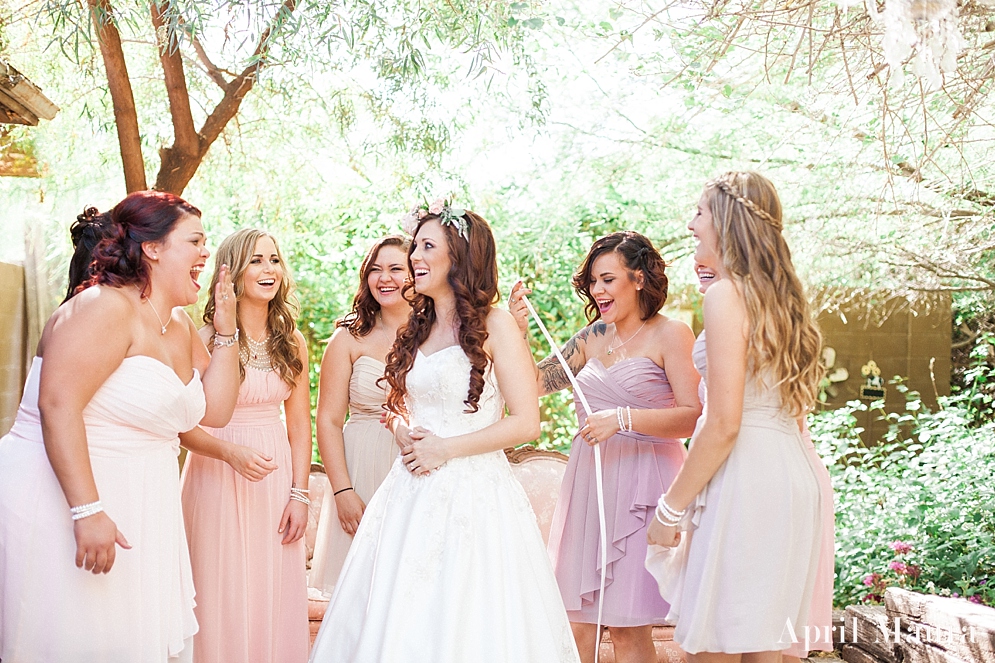 bride getting ready with her bridesmaids | lavender and pink bridesmaid dresses | The_Whispering_Tree_Ranch_Arizona_Wedding_April_Maura_Photography_0019.jpg