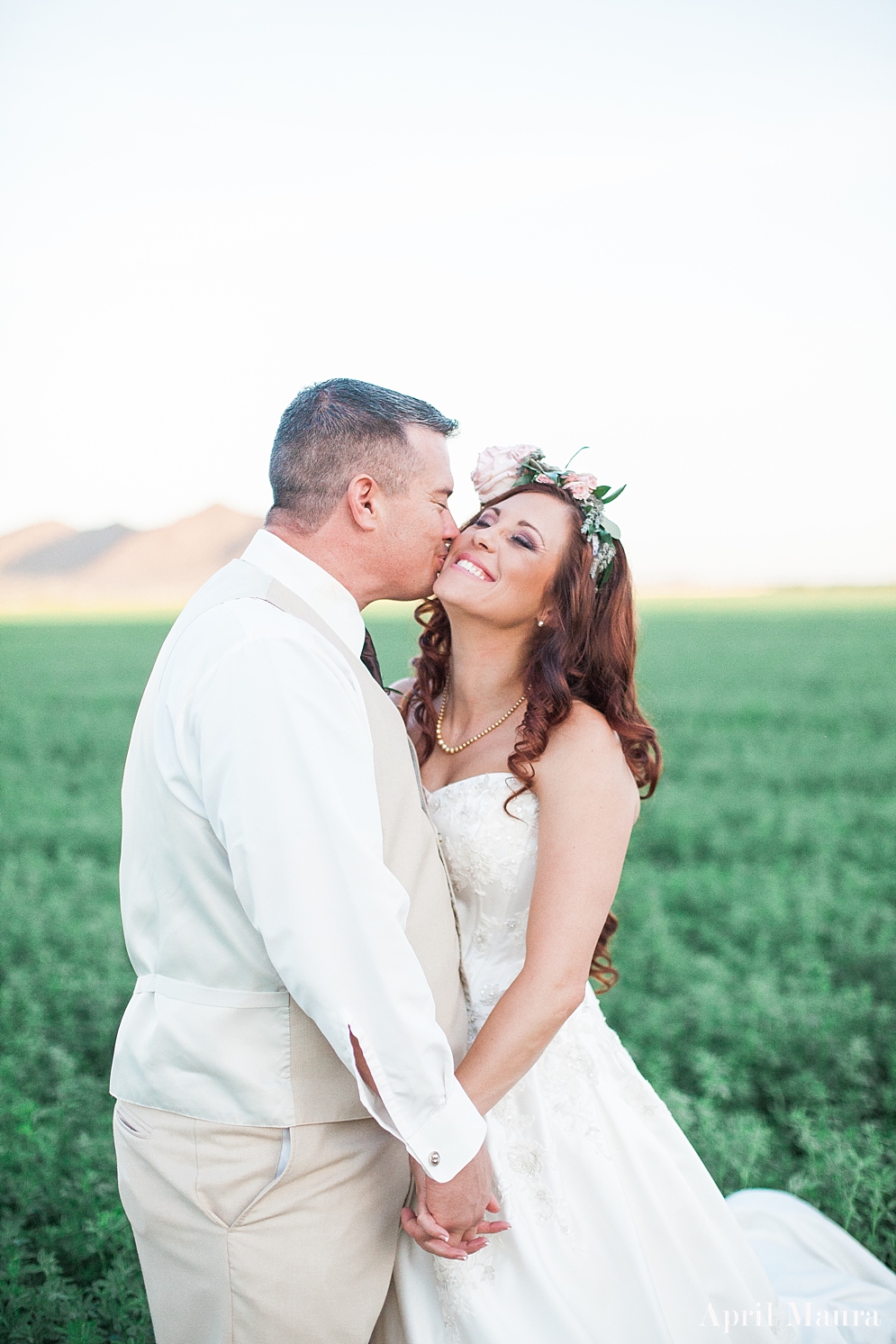 bride smiling in a field with her husband | The_Whispering_Tree_Ranch_Arizona_Wedding_April_Maura_Photography_0059.jpg