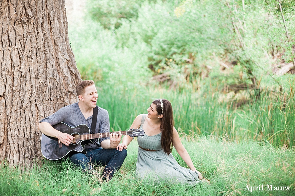 Green outdoor Arizona engagement location | fiancé singing to his bride and playing the guitar_0039.jpg