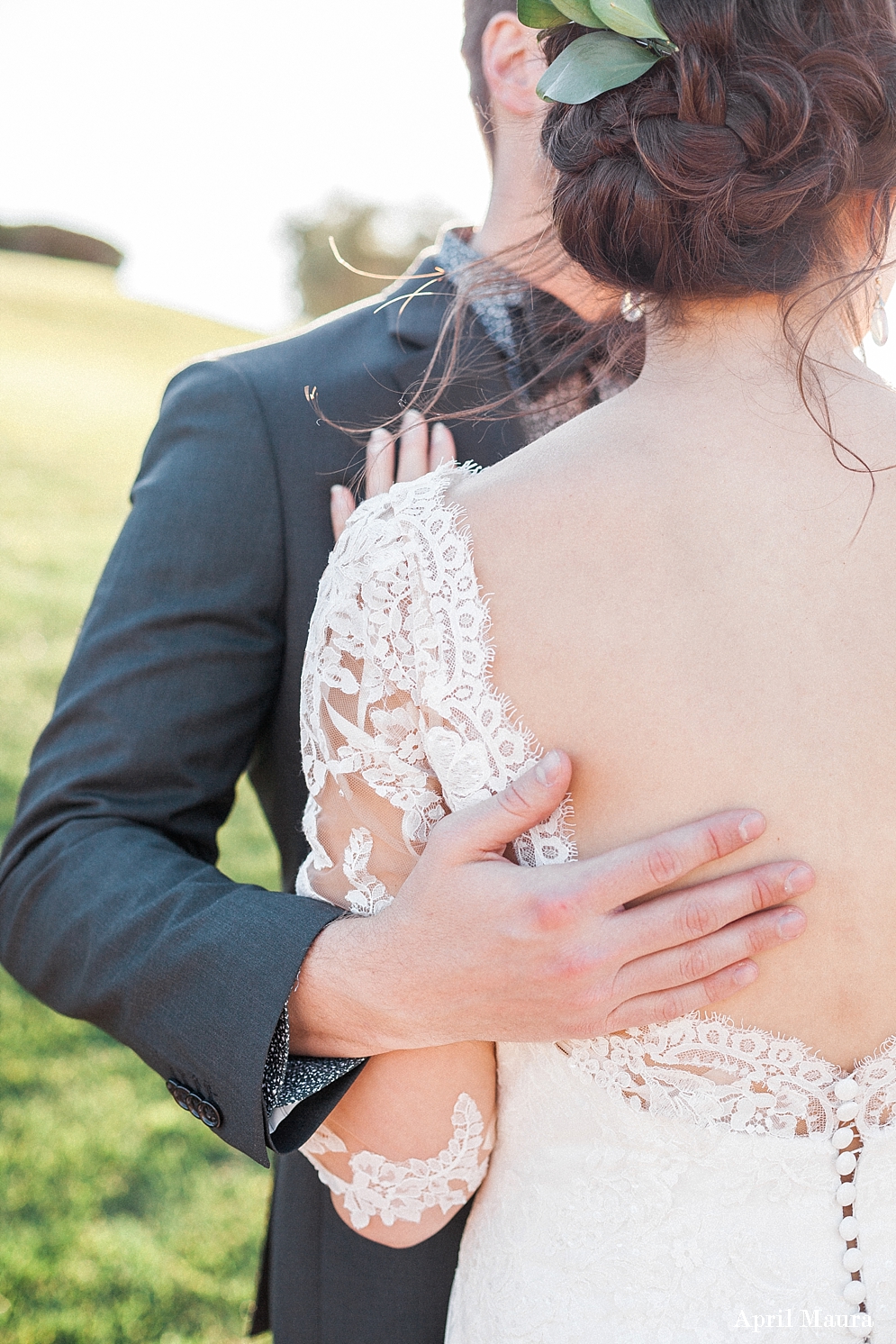 Silver Oaks Chateau Wedding Photos | St. Louis wedding photographer | groom embracing his wife | lace wedding sleeves