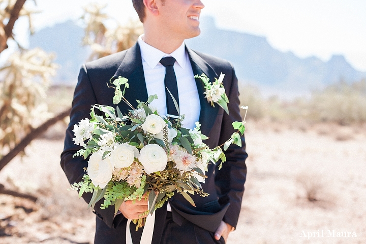 Groom holding a white bouquet | The Paseo Wedding | Scottsdale Engagement Photographer | April Maura Photography | www.aprilmaura.com_3685.jpg