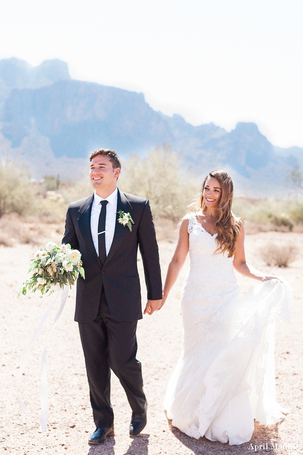 Couple walking on their wedding day | Superstition Mountain wedding | The Paseo Wedding | Scottsdale Engagement Photographer | April Maura Photography | www.aprilmaura.com_3687.jpg