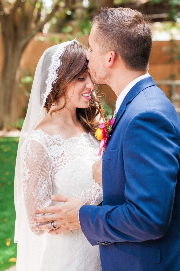St. Louis Jewish Wedding Traditions: Pre-Ceremony | Silver Oaks Chateau Wedding Photos | St. Louis Wedding Photographer | Blue groom tux | Groom kiss bride | Royal Palms Resort and Spa Wedding 