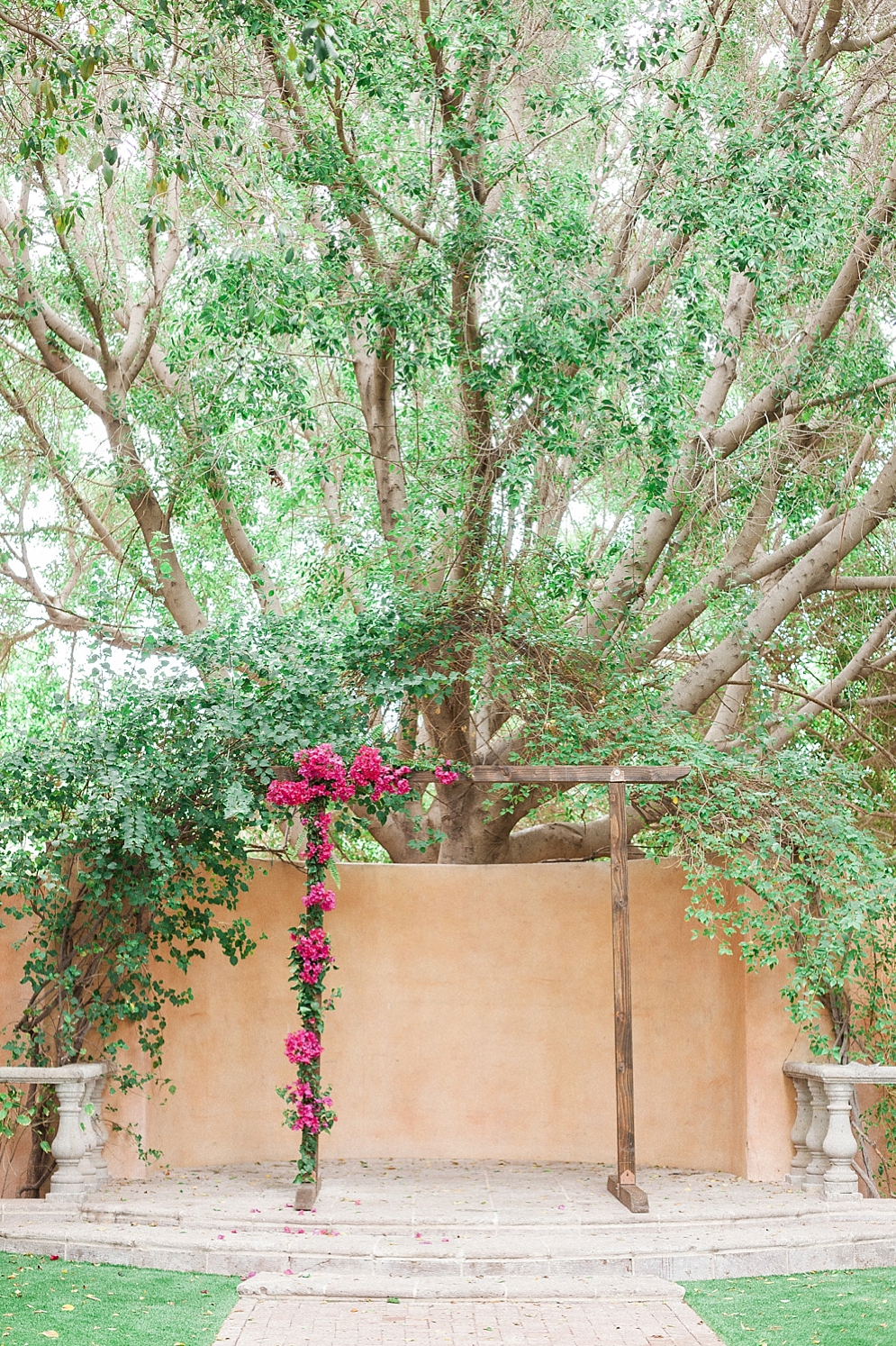 Wedding Wood Decorations to Incorporate | St. Louis Wedding Photographer | Royal Palms Resort and Spa Wedding | ceremony arch with pink flowers